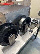 Bobines de matière première en atelier